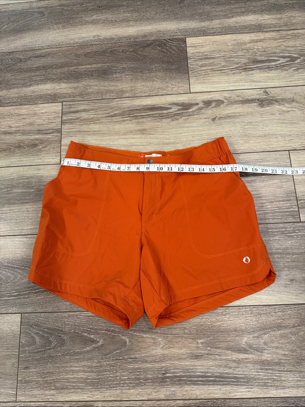 Women's Bright Orange Athletic Shorts with Subtle Logo